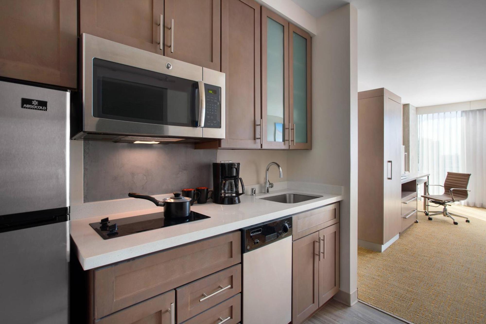 Studio King Room with Sofa Bed and City View - Mobility Accessible with Roll-In Shower